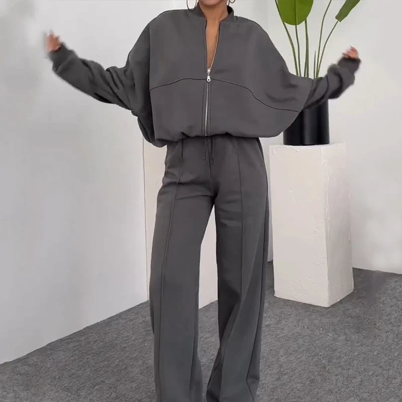 Completo casual di pantaloni e felpa con zip tinta unita