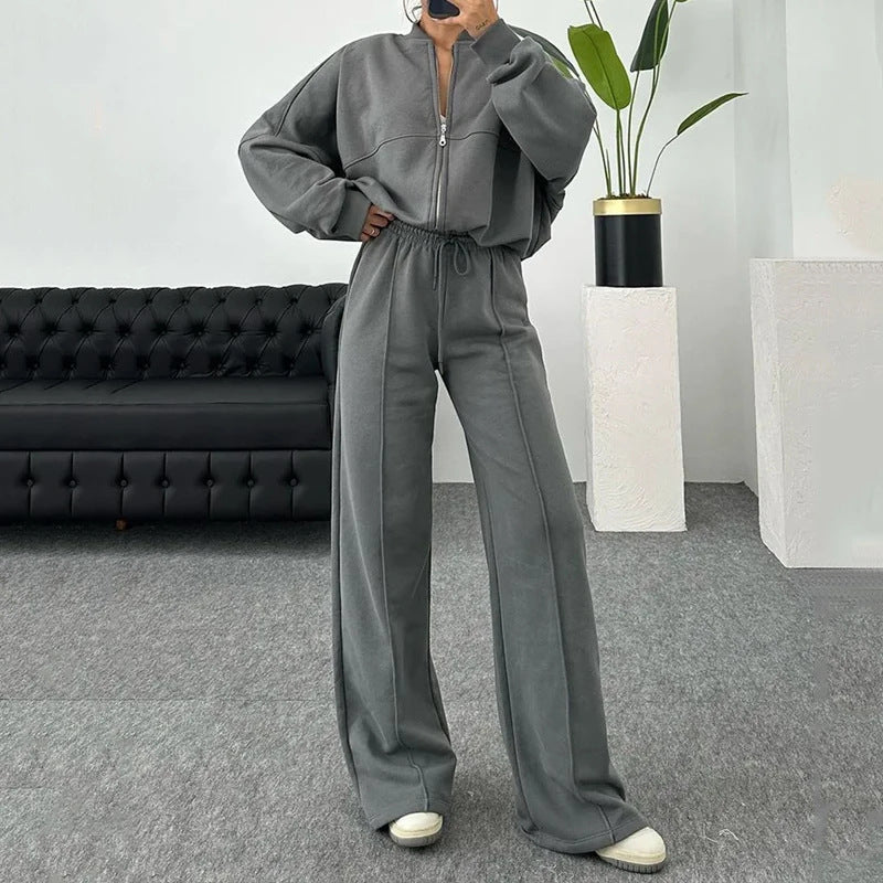 Completo casual di pantaloni e felpa con zip tinta unita