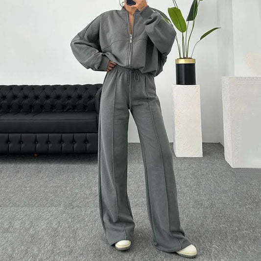 Completo casual di pantaloni e felpa con zip tinta unita
